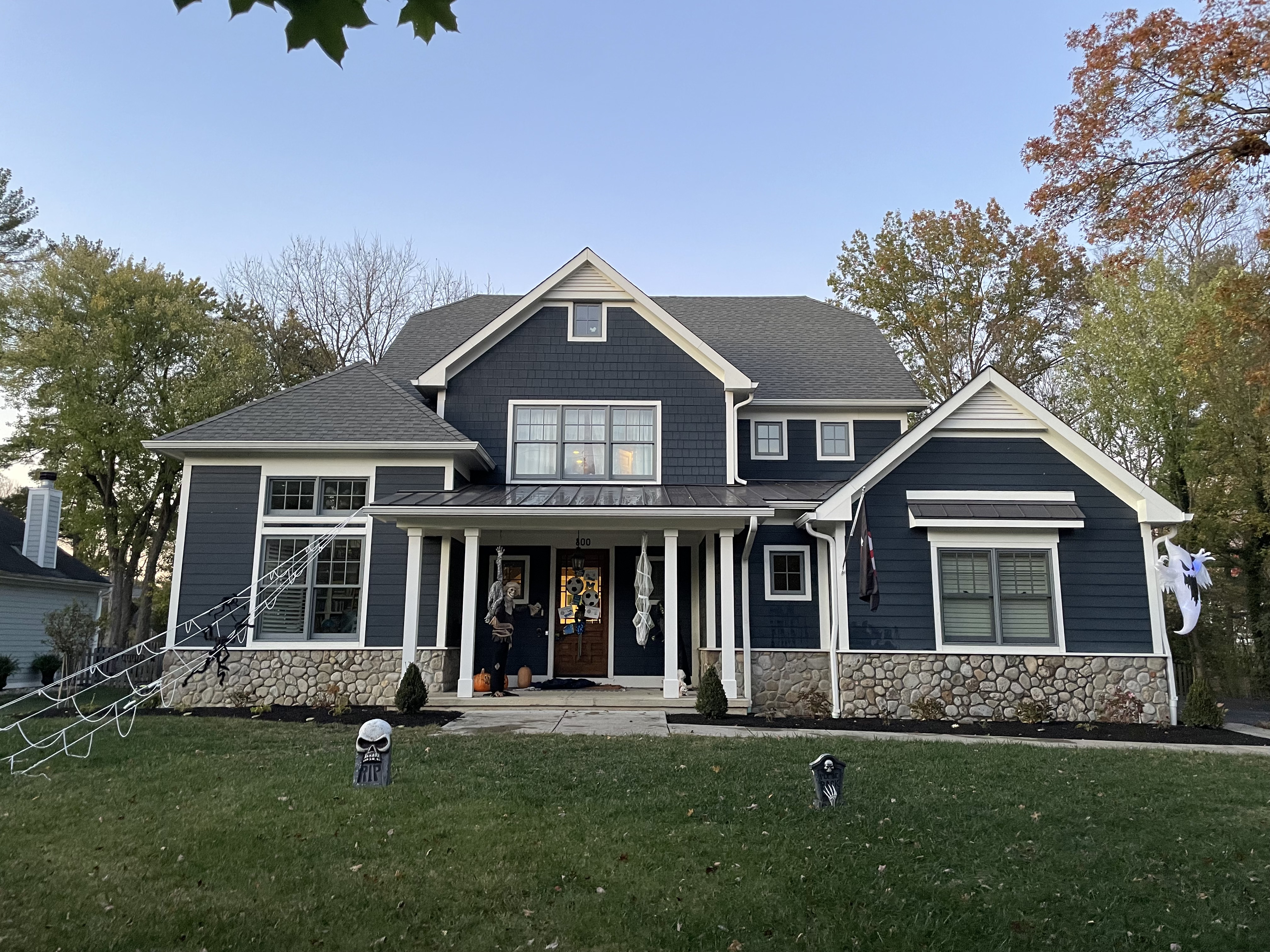 Beautiful navy blue home exterior professionally cleaned by Caldwell Clean in Pinellas County, FL